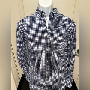 Long sleeve check dress shirt.